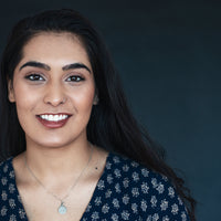 young-woman-in-blue-smiling freshengo